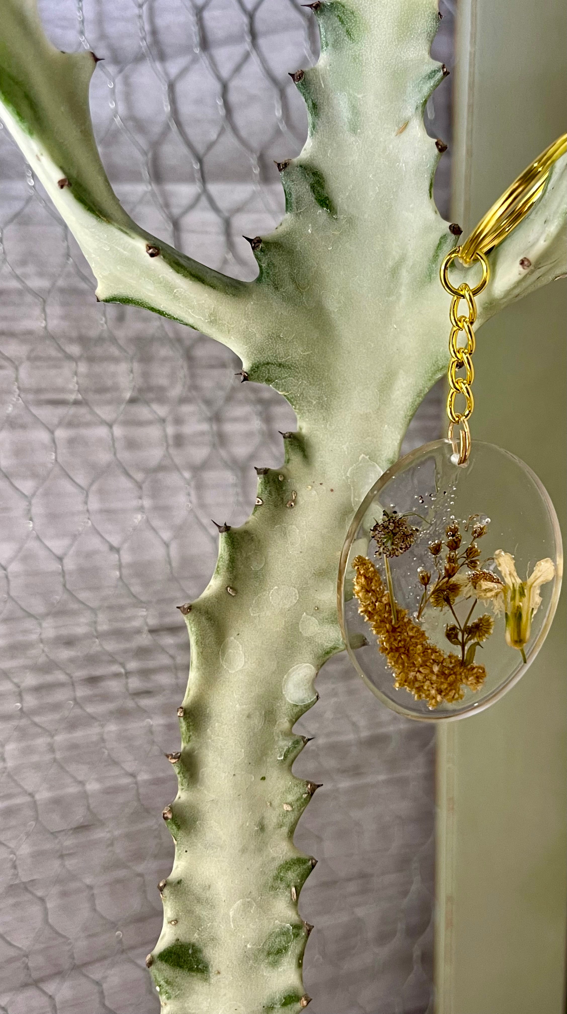 Resin keychain with pressed wildflowers
