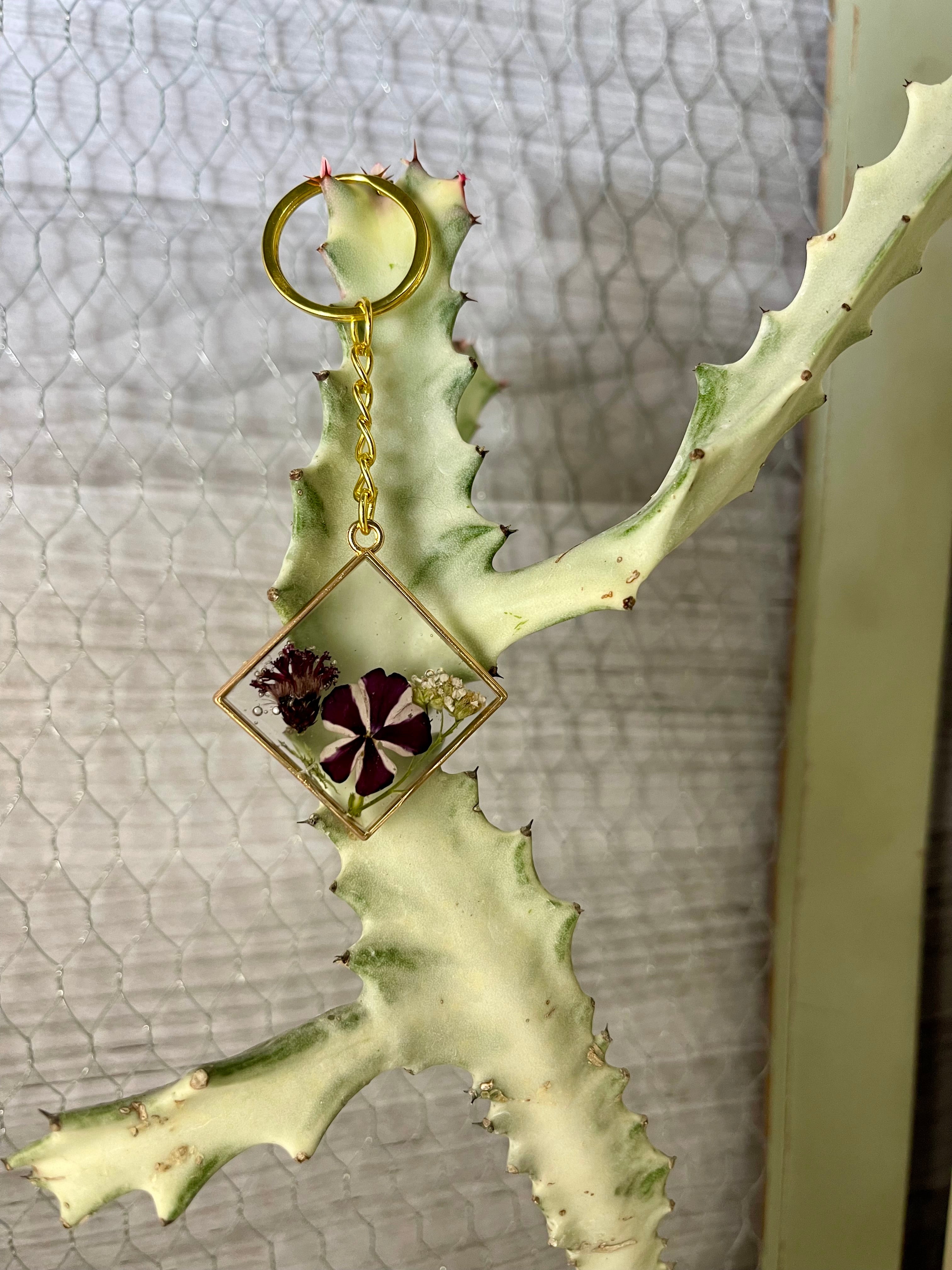 Resin keychain with pressed Wildflowers in metal frame