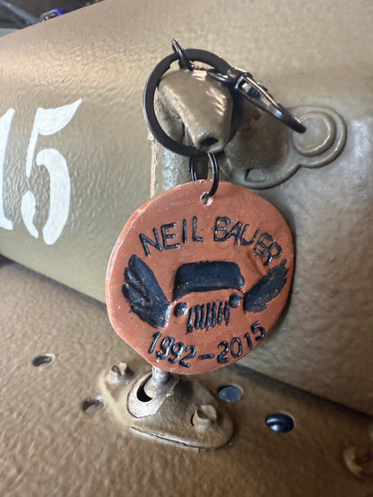 Green Jeep keychain with Neil’s Logo