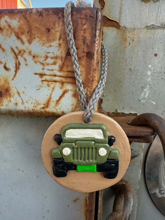 Green Jeep keychain with Neil’s Logo
