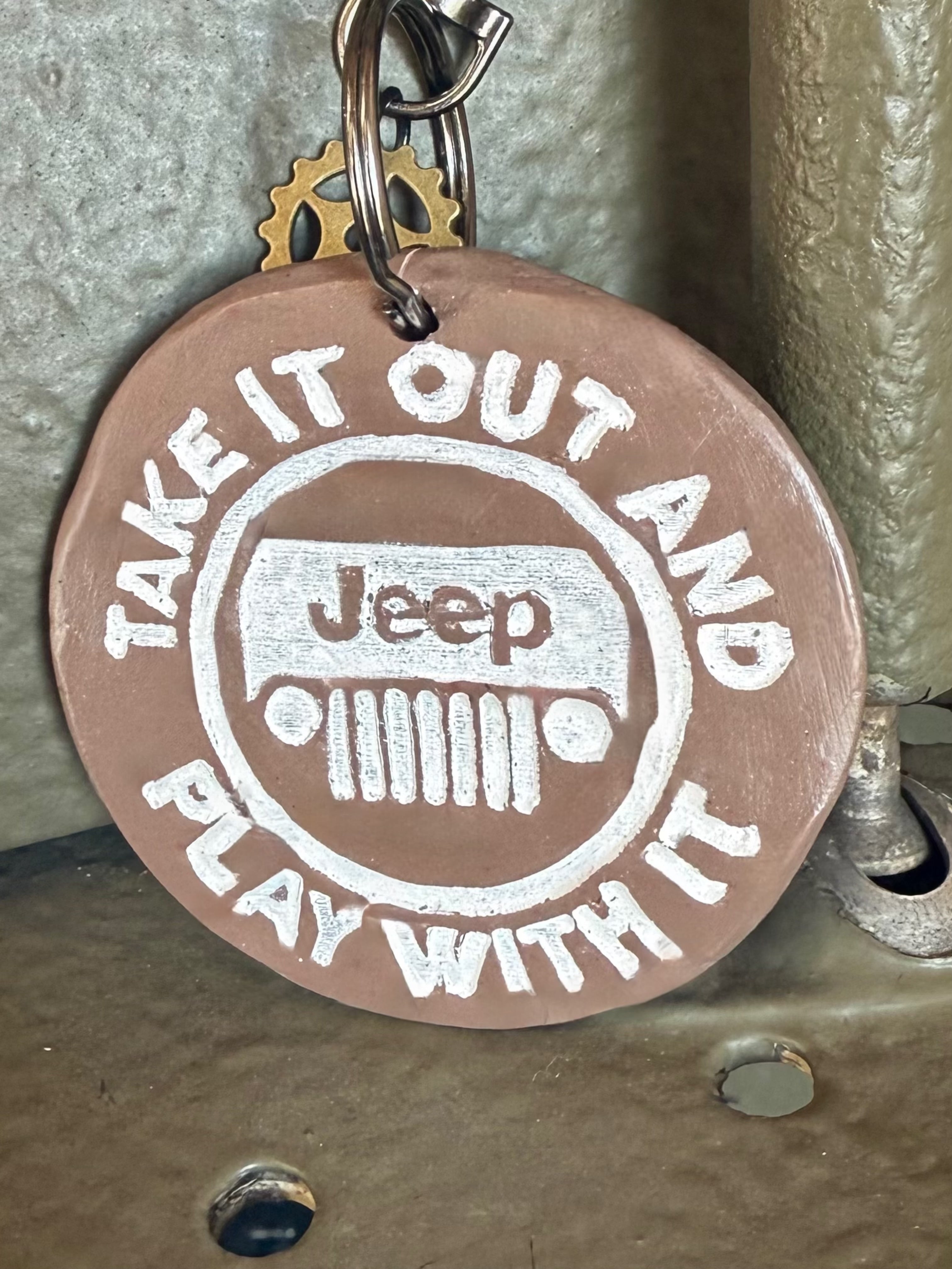 Take It Out And Play With It keychain with Neil’s Logo